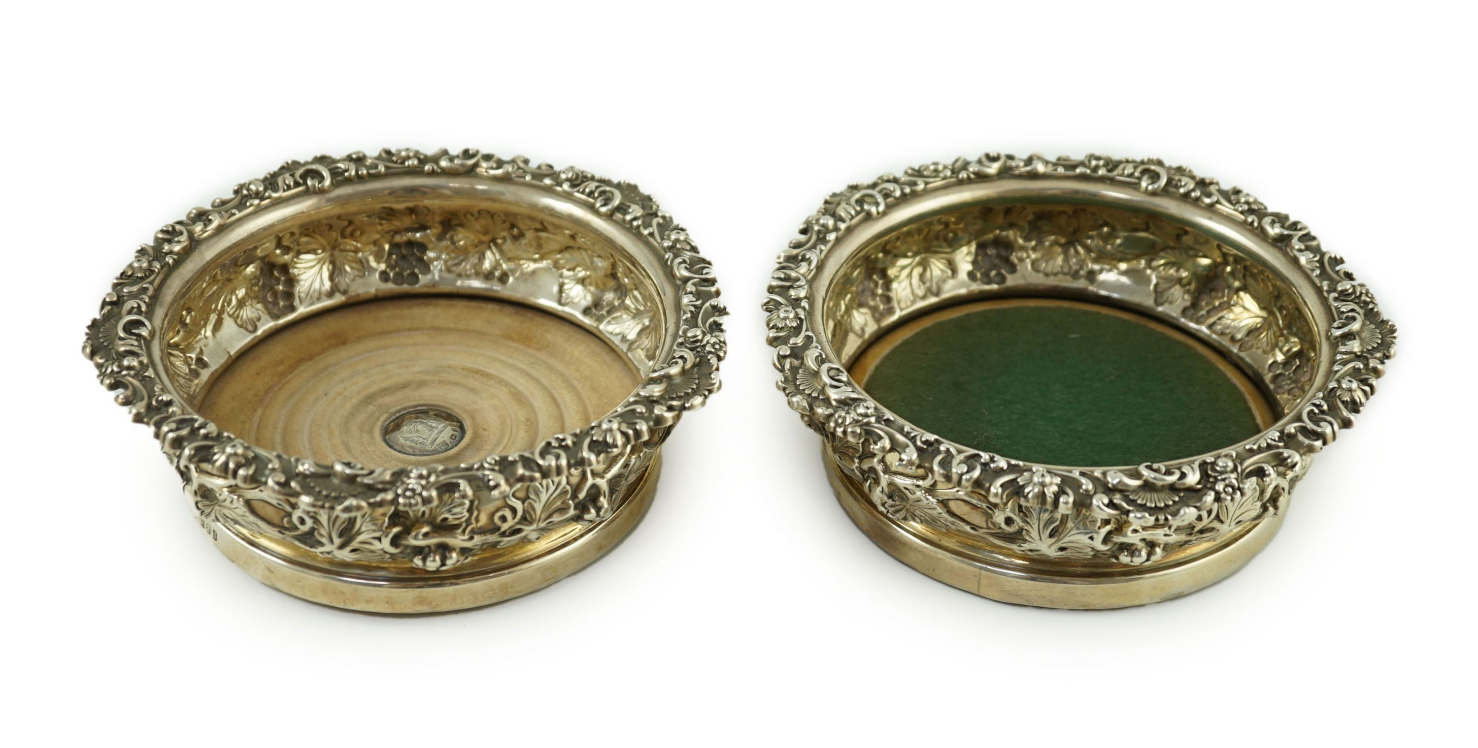 A pair of George IV silver mounted wine coasters, by S.C. Younge & Co